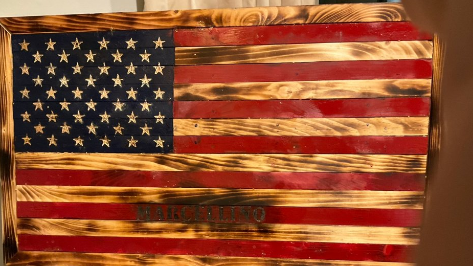 Classic American flag with red stripes and custom name