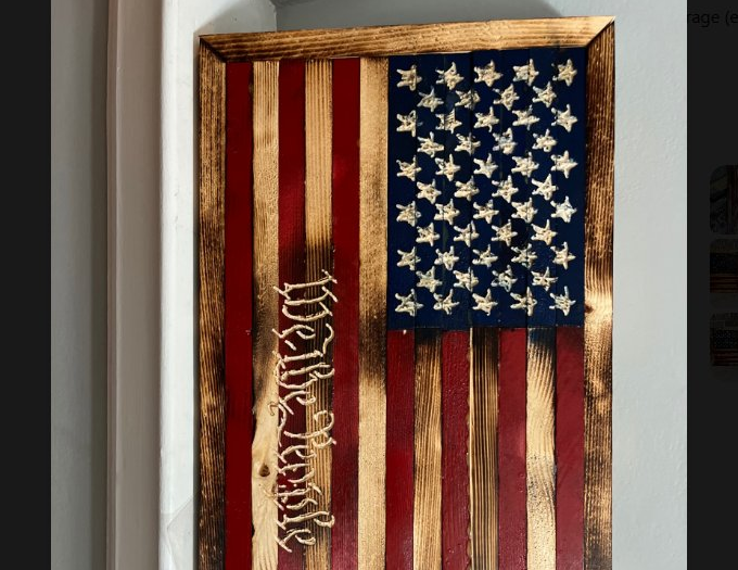 Custom engraved flag with We the People and classic red and white finish